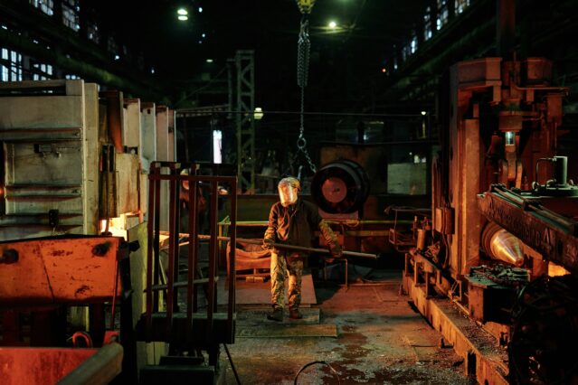 Man working in dark factory